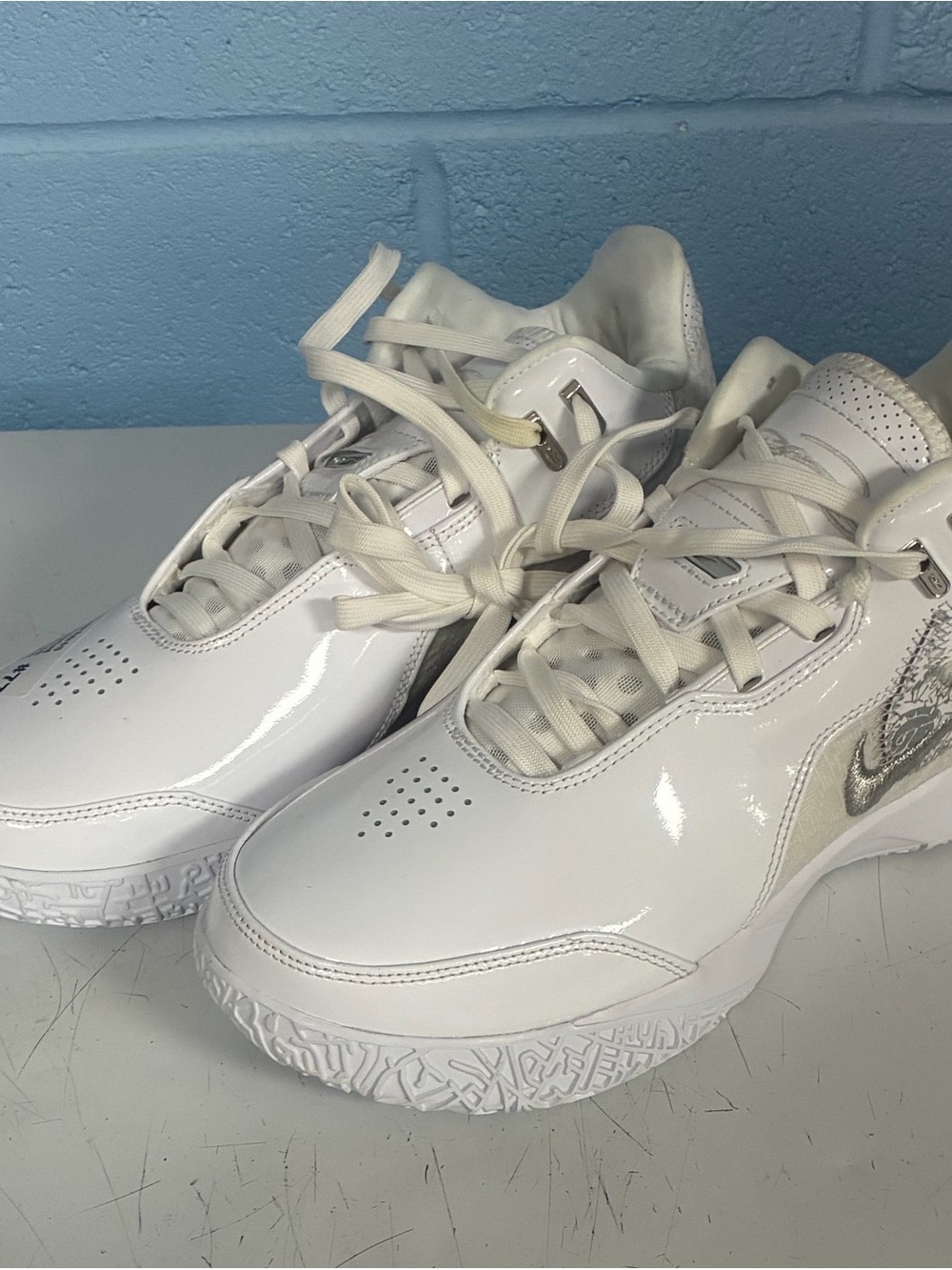 Nike Women's White Patent Leather Sneakers with Silver Swoosh